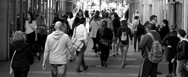 people walking on busy street