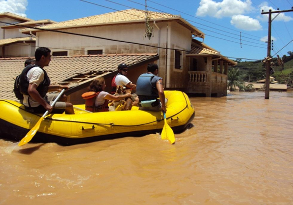 Rescue raft in high water near houses