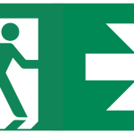 A green exit sign, with a stylized image of a person running out a door on the left, and a right-facing arrow on the right