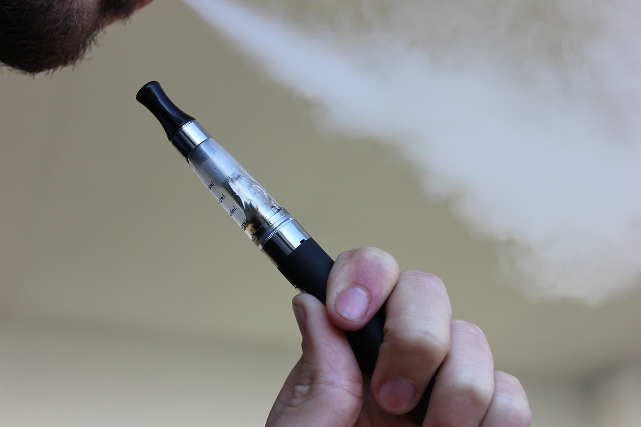 stock photo of someone using an e-cigarette