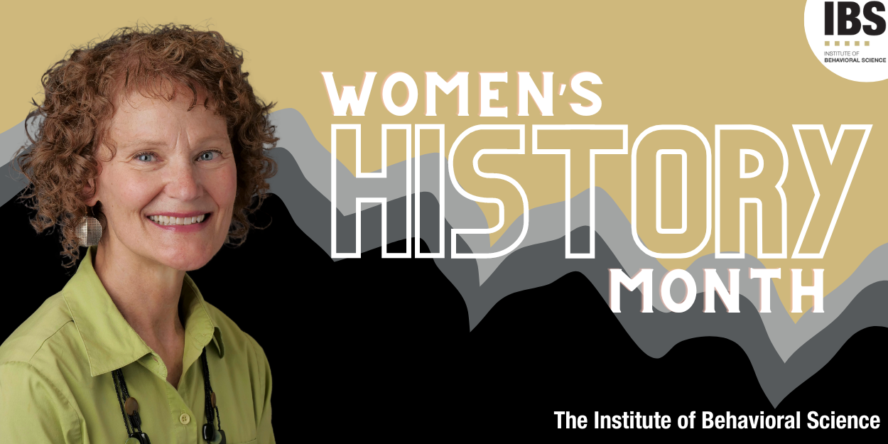Image of Anni Magyare wearing a lime green button down. A graphic of the flatirons and Women's History Month are in the background.