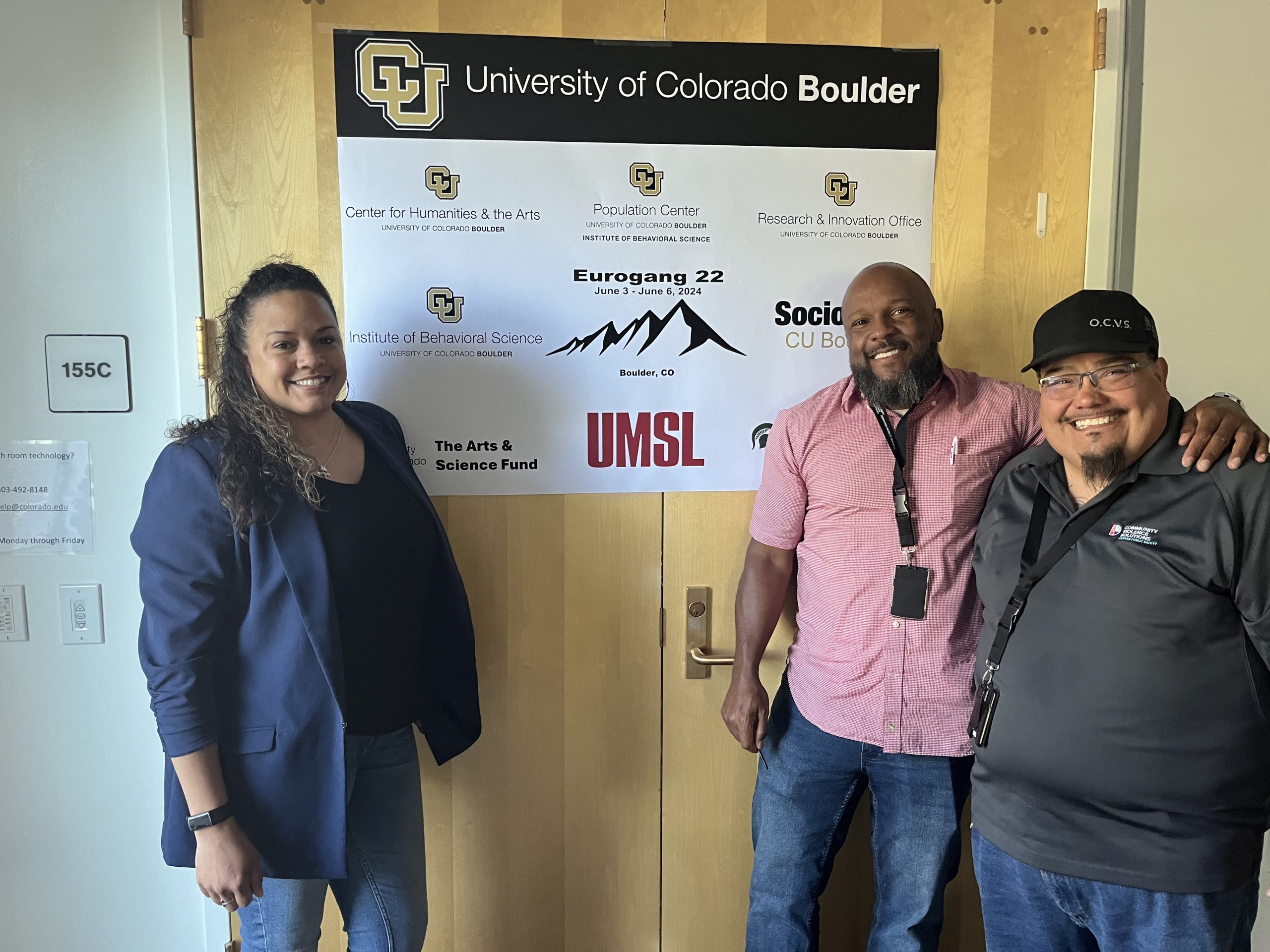Nicole Monroe (left), who leads the Denver Office of Community Violence Solutions, poses with her colleagues, Stephon Cummings and Ronald Blan (right) at the Eurogang XXII conference. 