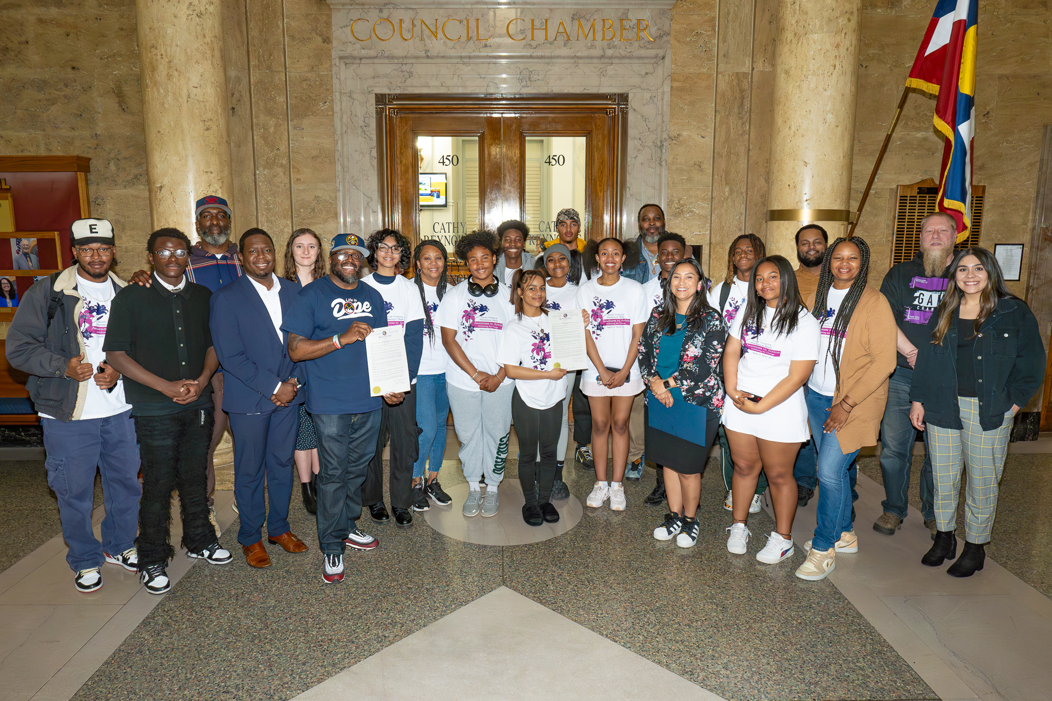 The Denver Game Changers, apart of the Youth Advisory Council for the Youth Violence Prevention Center-Denver, seen here at the Denver capitol at the proclamation of their new app.