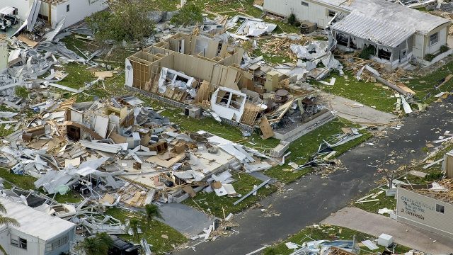 The aftermath of a hurricane: a mobile home park is in ruins.