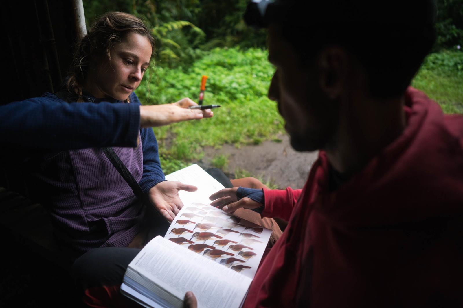 Savannah Lehnert talks with a local in the Amazon about agroforestry methods.